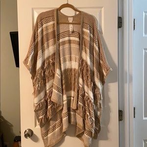 Beautiful camel and winter white cape.